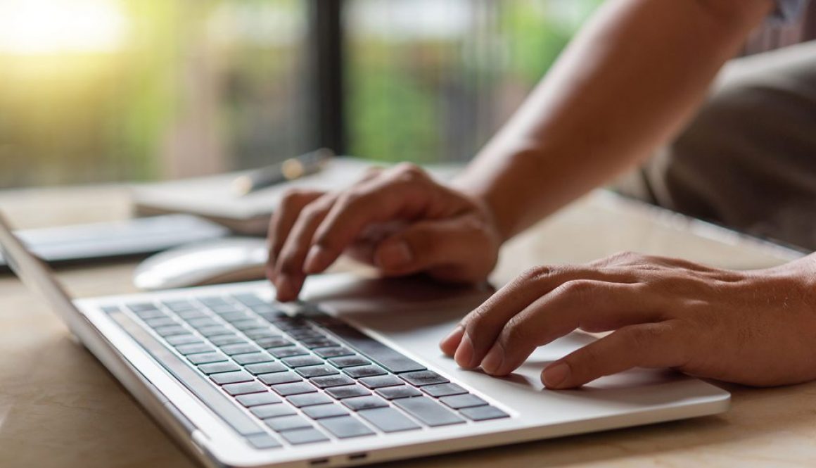 What to Write on Your Website to Attract More Customers What to Write on Your Website to Attract More Customers - typing on laptop