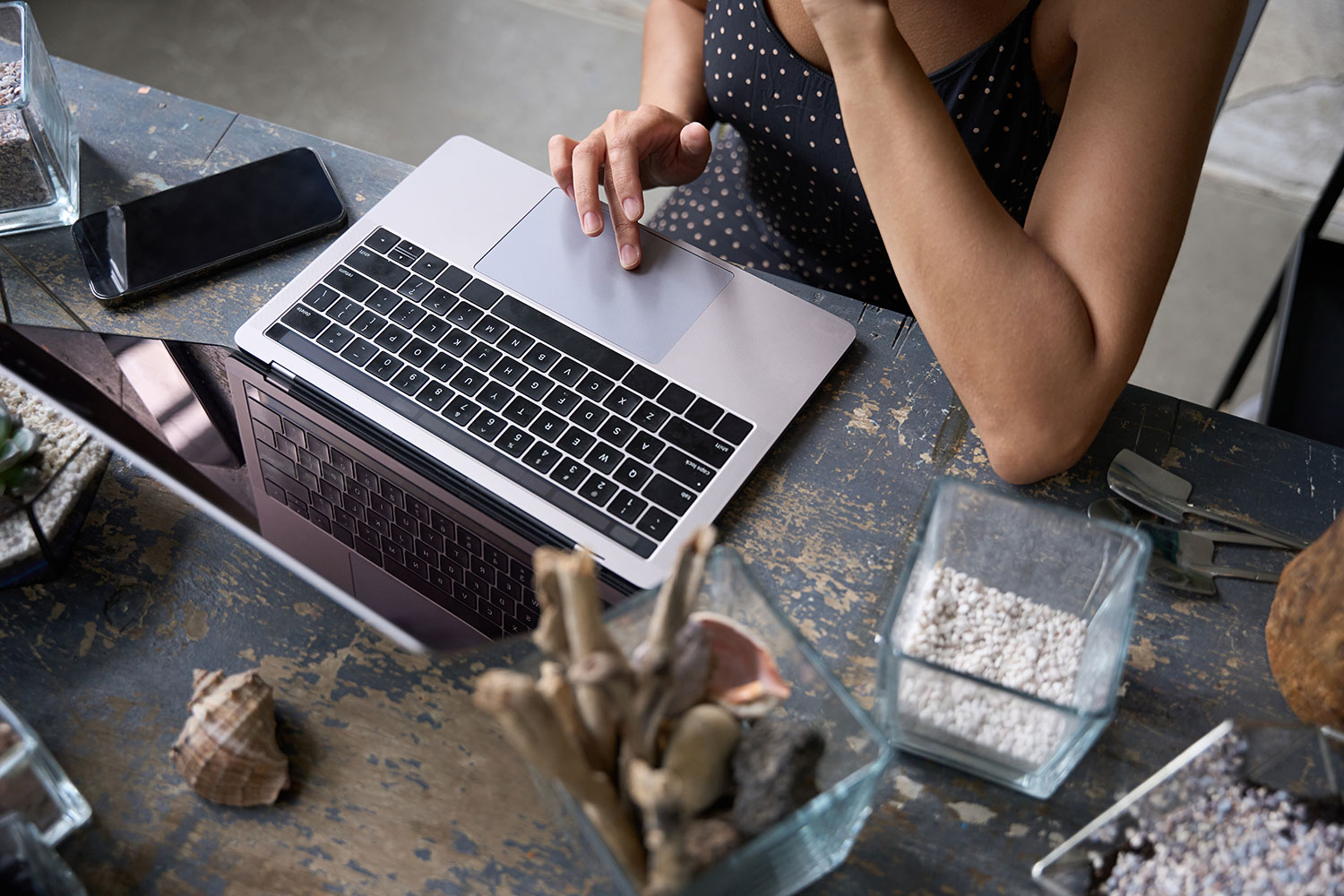What You Can Expect When You Redesign Your Website- Woman on Laptop