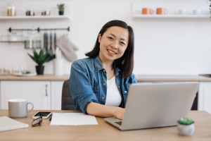 How to Show Google Your Website Is Alive and Worth Ranking - Business Woman on Laptop