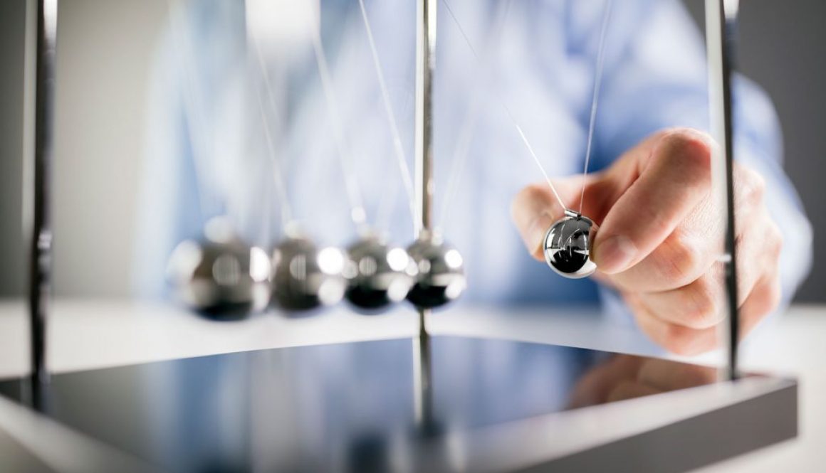 Is Your Website Creating the Connection That Makes People Take Action? Newtons cradle - business man