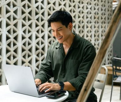 asian guy on laptop