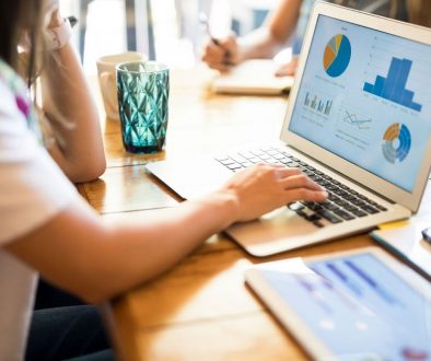 girl on laptop in restaurant
