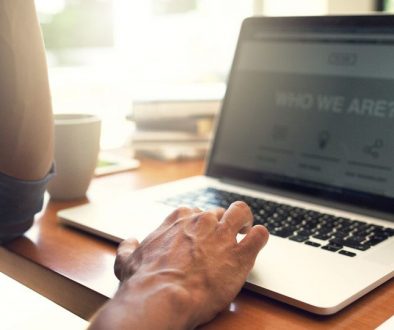 man on laptop, website homepage