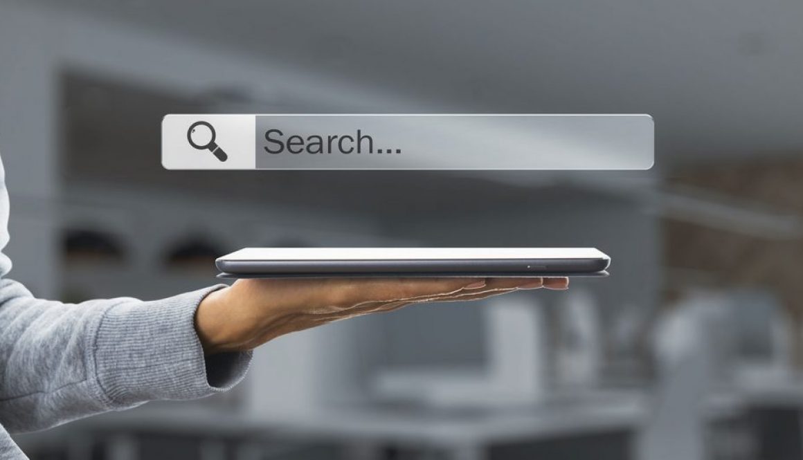 hand holding ipad internet browser search bar