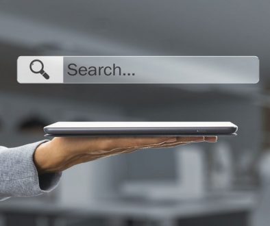 hand holding ipad internet browser search bar