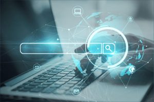 Laptop keyboard with search bar and globe