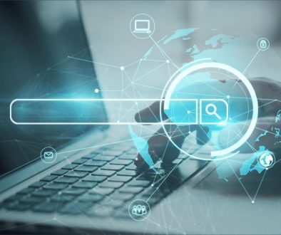 Laptop keyboard with search bar and globe