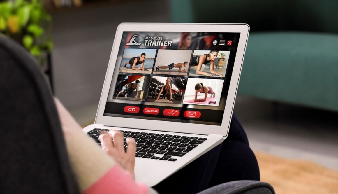 Laptop with woman looking at images