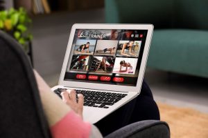 Laptop with woman looking at images